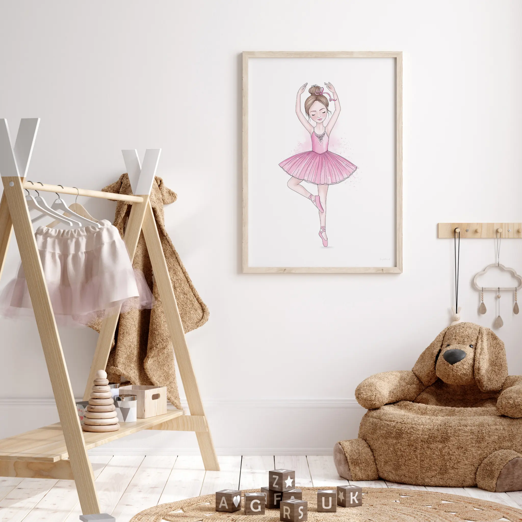 Children's room with ballet decor and plush bear.