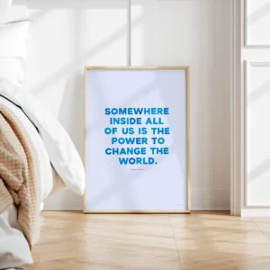 "Power to change the world" inspirational quote print by Roald Dahl - timber frame on bedroom floor